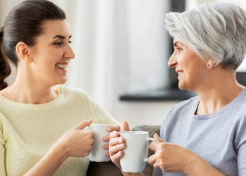 mother and daughter drinking milk