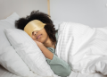 Woman sleeping with eye mask