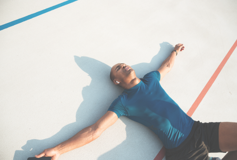 Young Tired African Sports Man Relaxing after Jogging