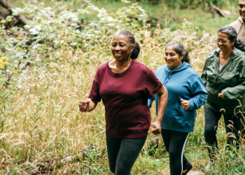 Group of older adults walking in nature